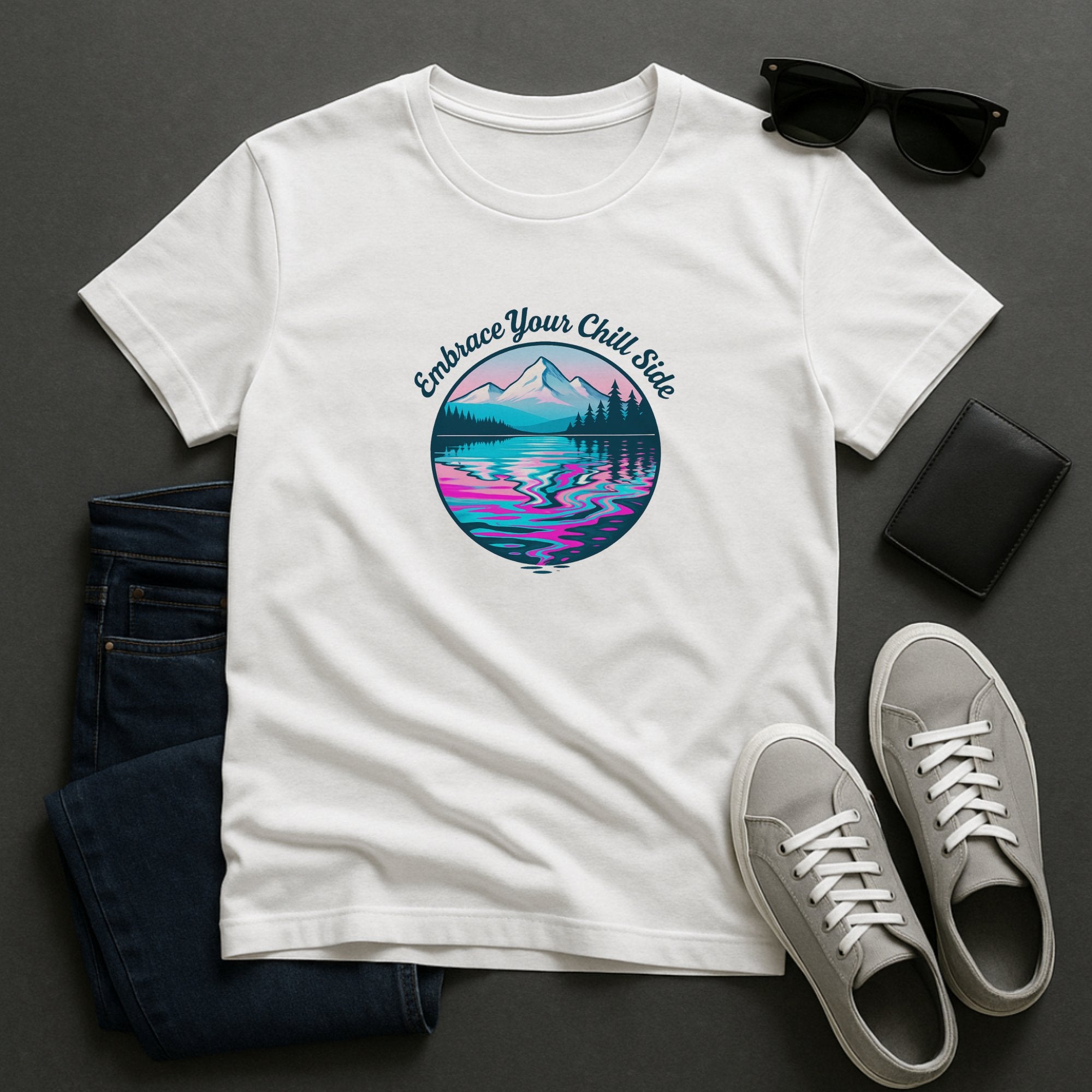 White mindfulness t-shirt with a calming mountain and lake illustration in pink and blue tones and the phrase “Embrace Your Chill Side,” promoting relaxation and inner peace