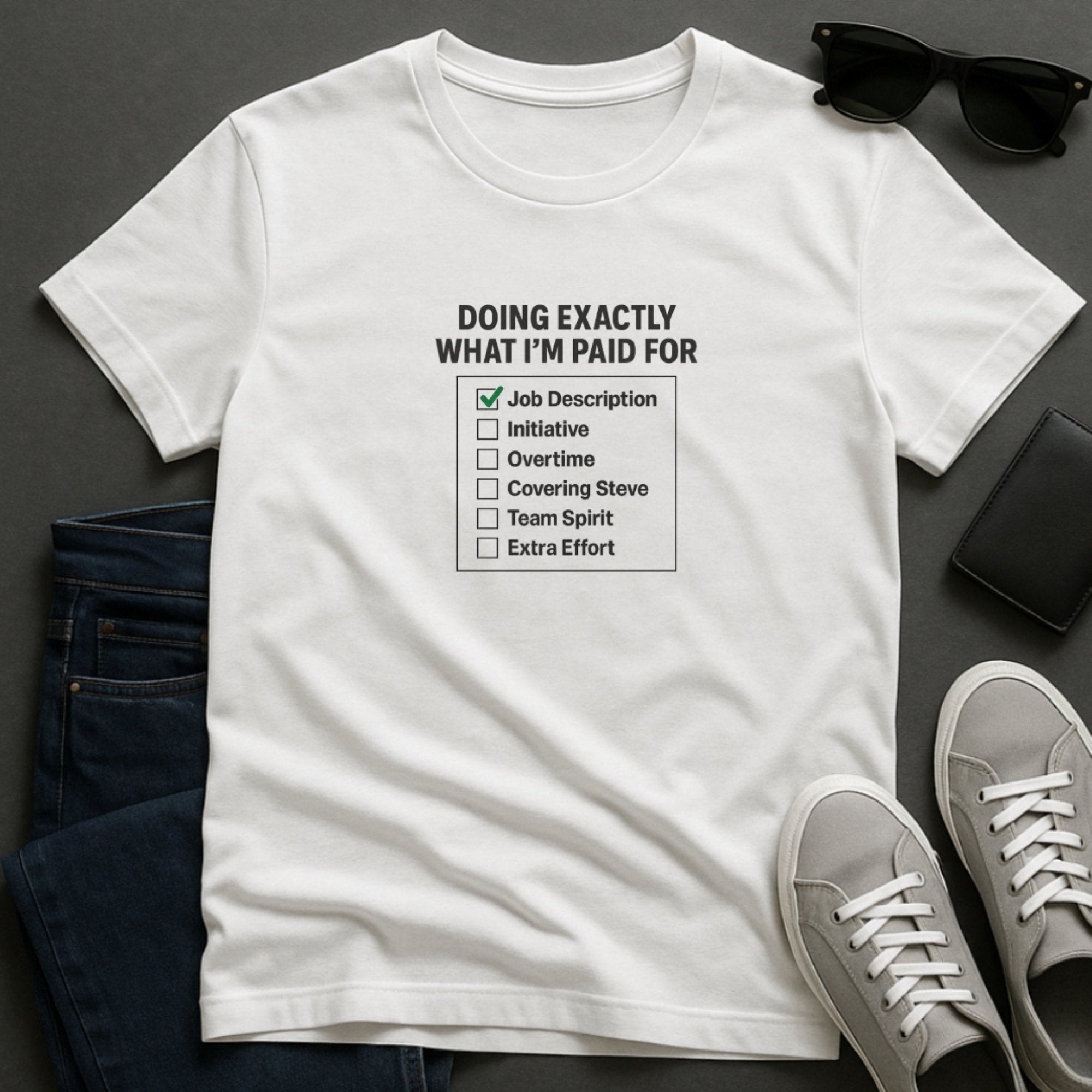 White workplace humor t-shirt with a checklist graphic saying “Doing Exactly What I’m Paid For” with only “Job Description” checked, poking fun at burnout, boundaries, and hustle culture