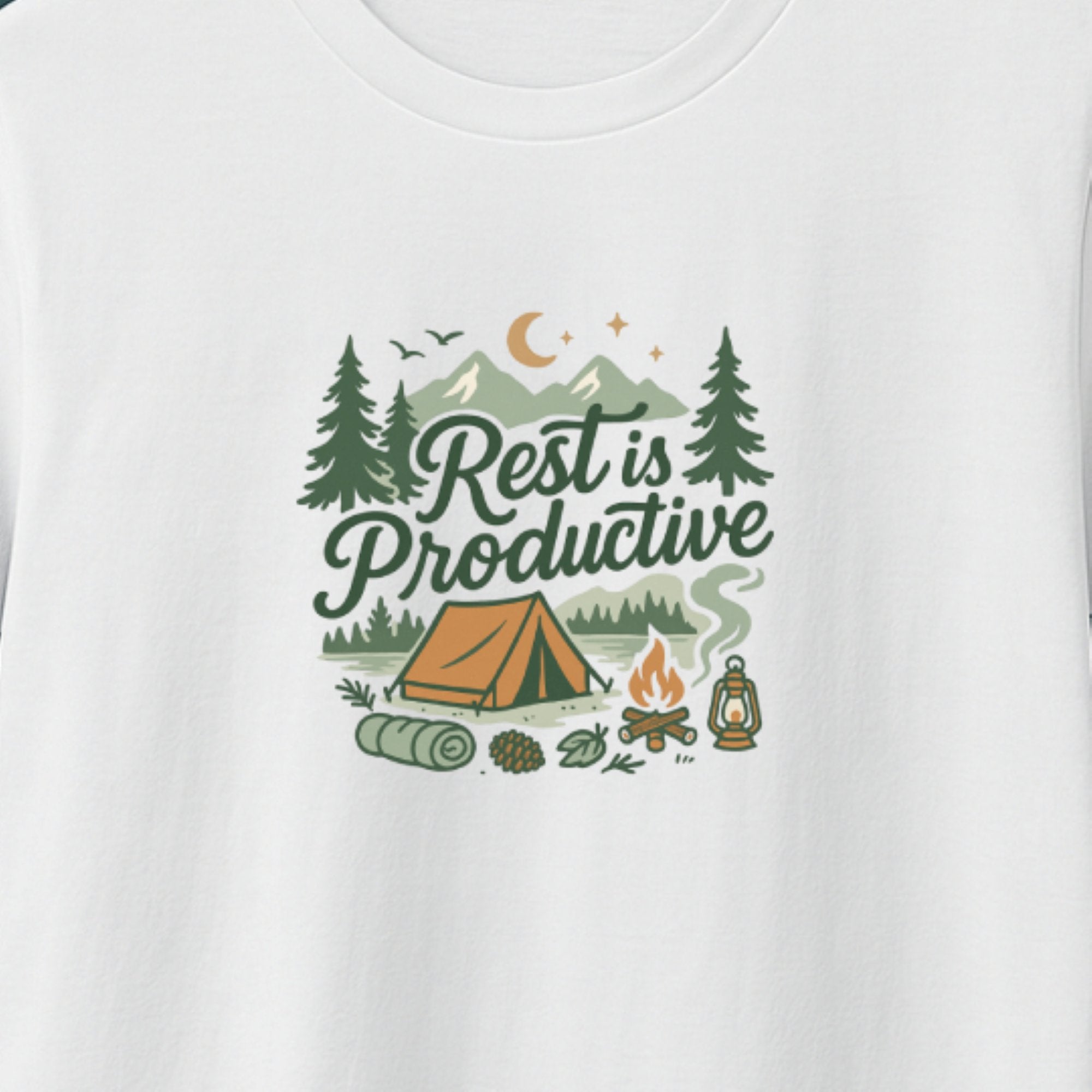 White t-shirt with 'Rest is Productive' graphic design featuring camping elements.